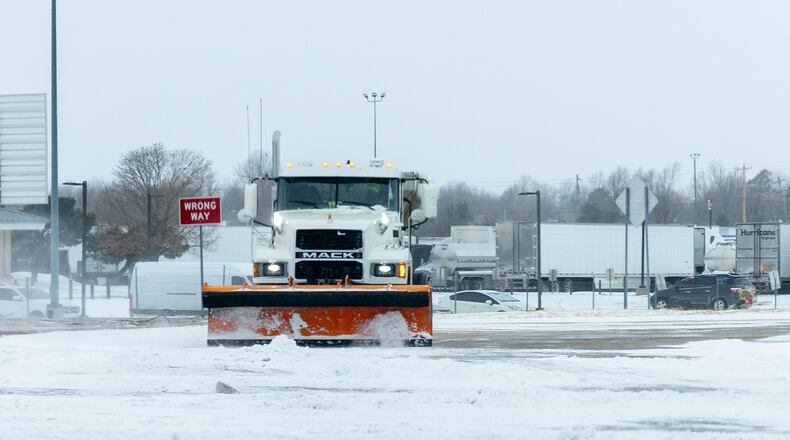 Oklahoma City street crews clear roadways of snow in Oklahoma City on Saturday, Jan. 24, 2026. (AP Photo/Alonzo Adams)