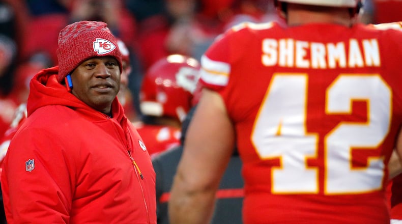 Kansas City Chiefs offensive coordinator Eric Bieniemy watches players before the team's AFC championship game against the New England Patriots Jan. 20, 2019, in Kansas City, Mo. The Chiefs have perhaps the most dynamic offense in the NFL and the San Francisco 49ers feature one of the stingiest defenses in the league. The men in charge of the units got interviews for head coaching but were passed over. (Charlie Riedel/AP)