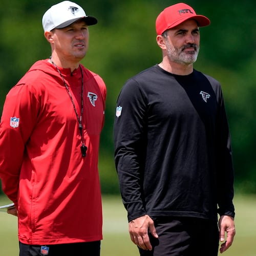 Falcons head coach Kevin Stefanski (right) watches players work out during rookie minicamp on Friday, May 8, 2026, in Flowery Branch. (Mike Stewart/AP)