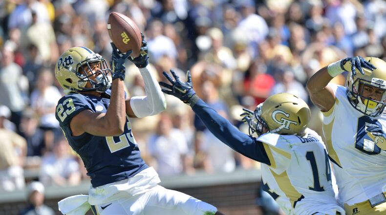 October 17, 2015 Atlanta - Pittsburgh Panthers wide receiver Tyler Boyd (23) catches a touchdown pass under pressure from Georgia Tech Yellow Jackets defensive back Corey Griffin (14) in the first half at Bobby Dodd Stadium on Saturday, October 17, 2015. HYOSUB SHIN / HSHIN@AJC.COMt34