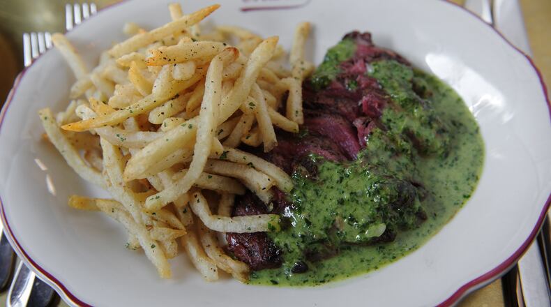 150930-ATLANTA-GA- Marcel dining review by Ligaya Figueras, shot on Wednesday September 30, 2015. FOOD: L'Entrec�te, frites and sauce verte. (Becky Stein Photography)