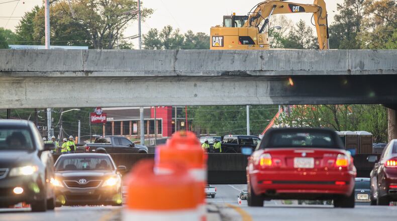 With the I-85 bridge collapse continuing to snarl traffic, Uber and IKEA are offering discounts to make the trip easier, or at least worth it. John Spink/AJC