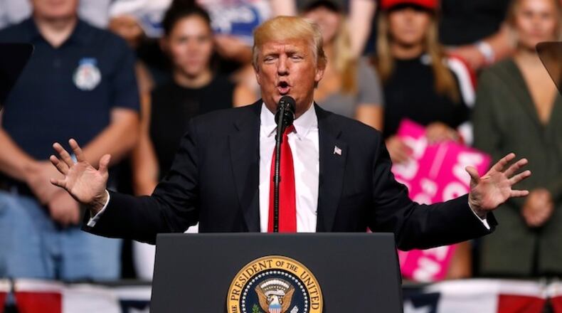President Donald Trump speaks during a rally, Wednesday, June 21, 2017, in Cedar Rapids, Iowa. (AP Photo/Charlie Neibergall)