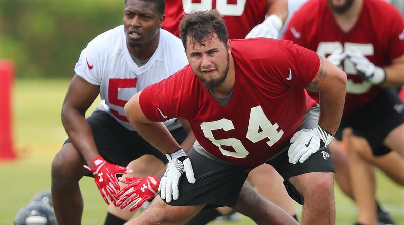 Falcons rookie guard Sean Harlow loosens up during rookie minicamp. Curtis Compton/ccompton@ajc.com