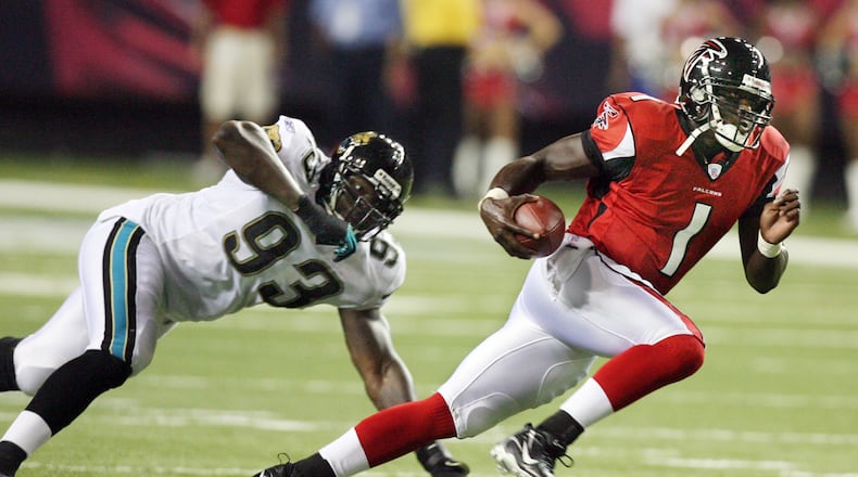 Falcons quarterback D.J. Shockley makes a long run on August 31, 2006. (CURTIS COMPTON/ AJC staff)