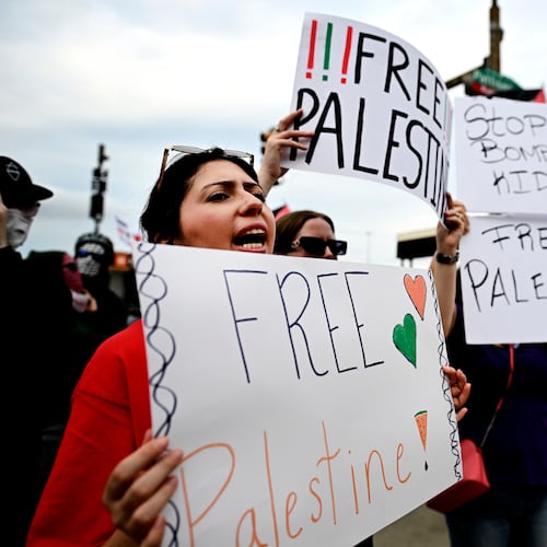 Pro-Palestinian demonstrators hold signs during a "Free Palestine" protest before an Ed Sheeran concert in Philadelphia, Saturday, Sept. 19, 2026. (AP Photo/Allie Ippolito)