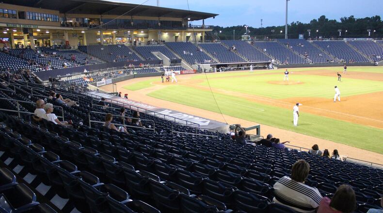 A few fans show up for the Gwinnett Stripers game against the Louisville Bats in a minor league baseball game at Coolray Field on Monday, August 13, 2018, in Lawrenceville. JENNA EASON / JENNA.EASON@COXINC.COM