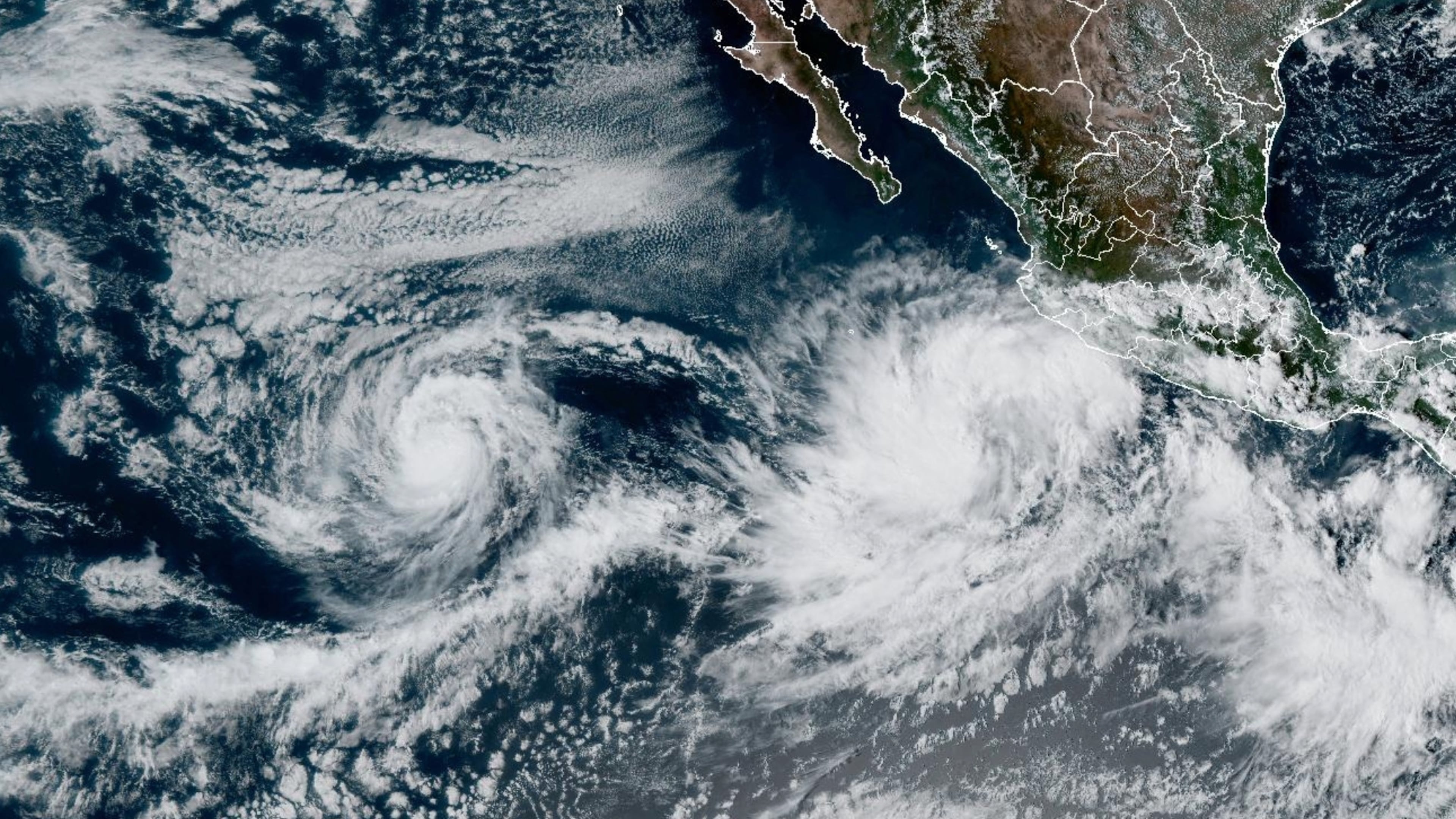 This NOAA satellite image taken at 5:20 p.m. EST on Saturday, Oct. 4, 2025, shows Tropical Storm Priscilla in the East Pacific Ocean off the coast of Mexico. (NOAA via AP)