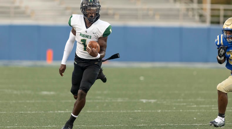 Langston Hughes’s Prentiss Air Noland (1) runs the ball during a GHSA High School football game between Langston Hughes High School and McEachern High School at McEachern High School in Powder Springs, GA., on Friday, August 26, 2022. (Photo by Jenn Finch)