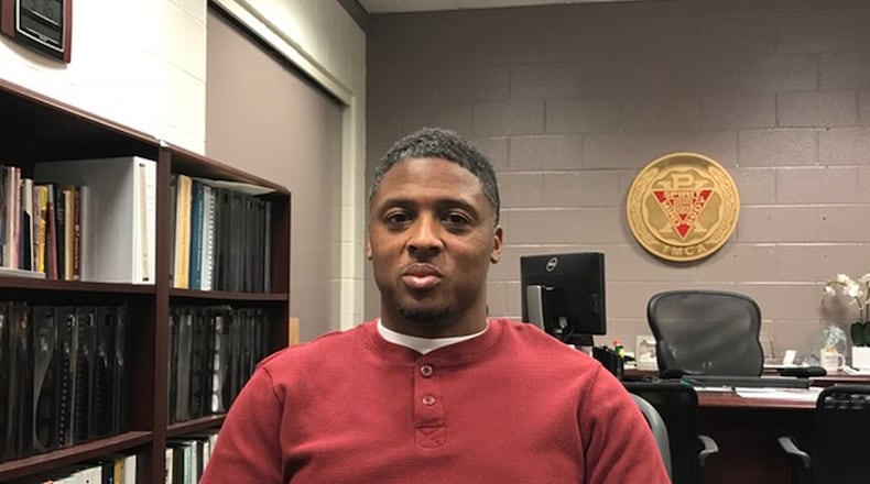 Ex-Falcon and Atlanta resident Warrick Dunn is the founder of “Homes for the Holidays,” a program by Warrick Dunn Charities that provides down payments on houses for single parents and struggling families. Contributed by Angela Tuck