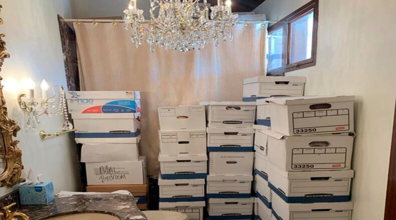 FILE - This image, contained in the indictment against former President Donald Trump, shows boxes of records stored in a bathroom and shower in the Lake Room at Trump's Mar-a-Lago estate in Palm Beach, Fla. (Justice Department via AP)
