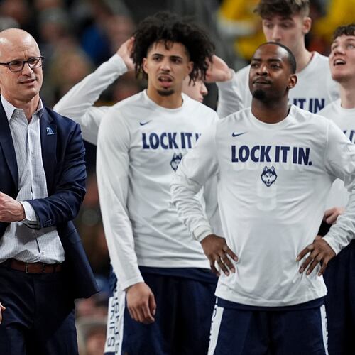 UConn head coach Dan Hurley, left, reacts during the second half of the NCAA college basketball tournament national championship game against Michigan at the Final Four, Monday, April 6, 2026, in Indianapolis. (AP Photo/Abbie Parr)