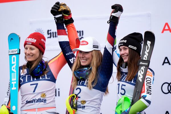 Second place finisher Germany's Lena Duerr, from left, first place finisher United States' Mikaela Shiffrin and third place finisher Slovenia's Andreja Slokar pose on the podium after the women's slalom at the World Cup Finals, Thursday, March 27, 2025, in Sun Valley, Idaho. (AP Photo/Robert F. Bukaty)