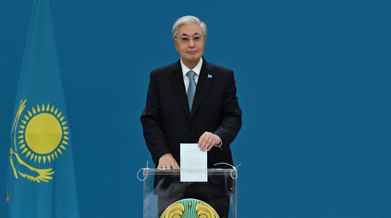 In this photo released by Kazakhstan's President Press Office, Kazakhstan's President Kassym-Jomart Tokayev casts his ballot at a polling station in Astana, Kazakhstan, Sunday, Aug. 23, 2026.(Kazakhstan's President Press Office via AP)