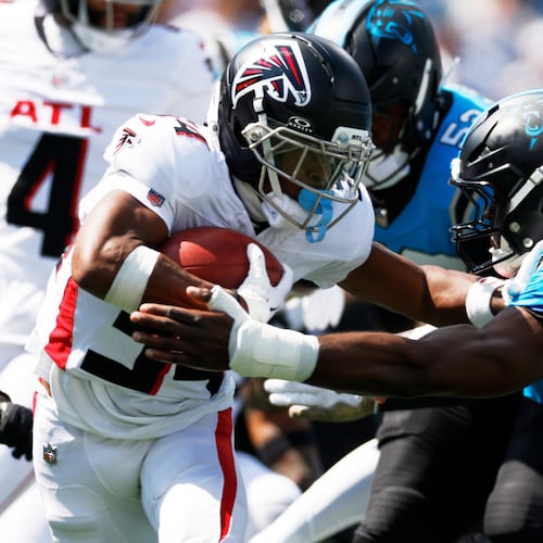 Atlanta Falcons wide receiver Ray-Ray McCloud is tackled by Carolina Panthers defensive tackle Cam Jackson during the first half of an NFL football game, Sunday, Sept. 21, 2025, in Charlotte, N.C. (AP Photo/Rusty Jones)