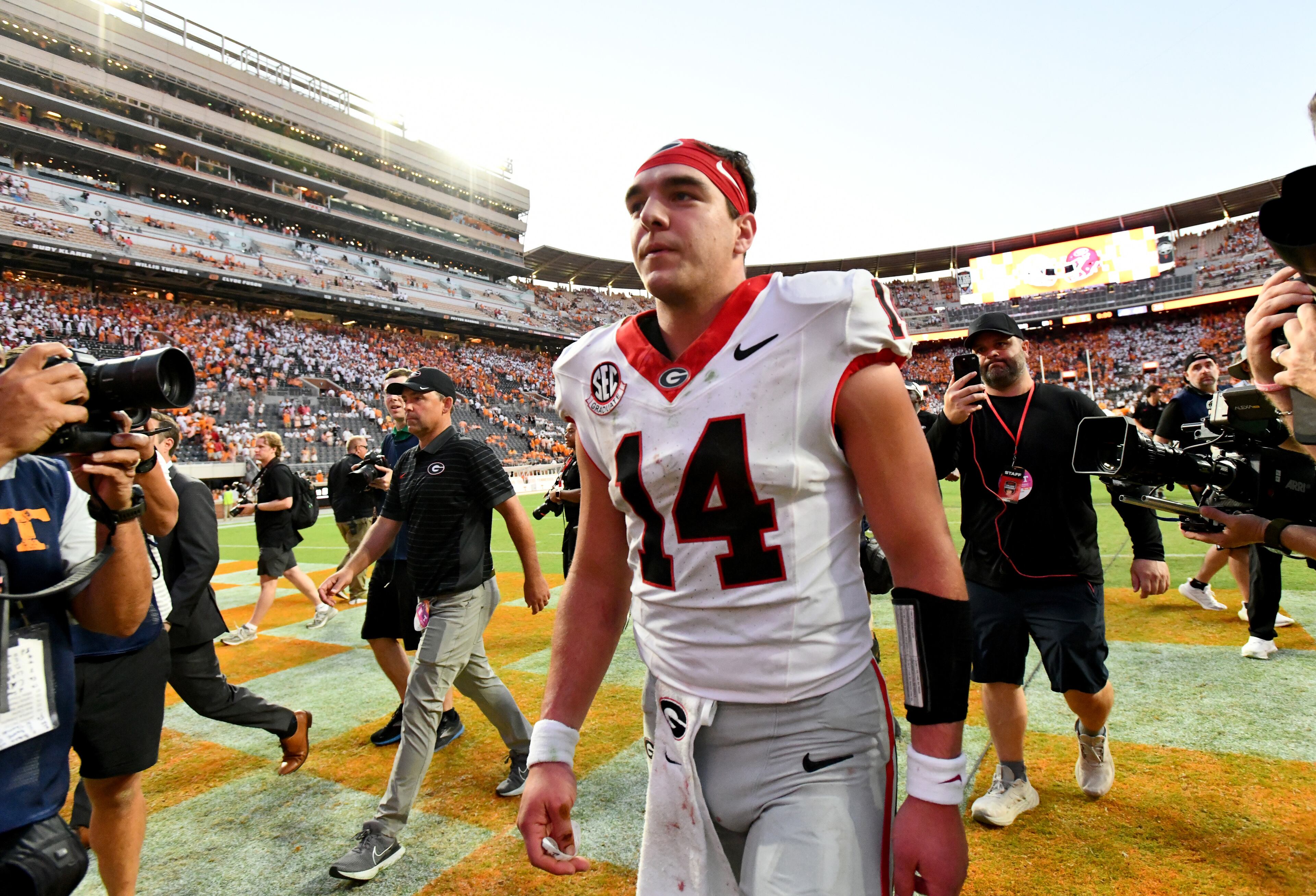 Georgia quarterback Gunner Stockton leaves the football field after Georgia beat Tennessee in overtime at Neyland Stadium on Saturday, Sept. 13, 2025, in Knoxville, Tenn. (Hyosub Shin/AJC)