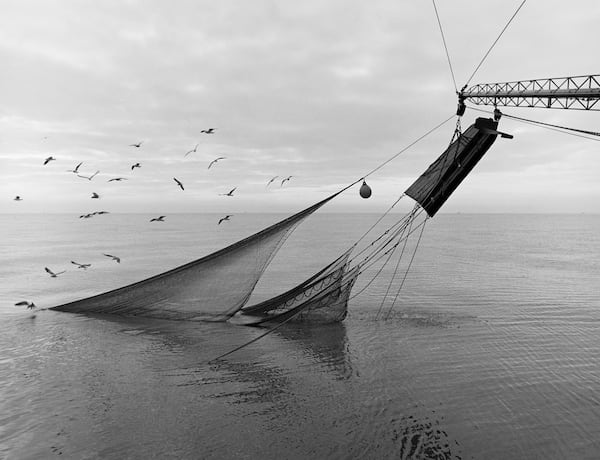 "Nets & Doors," a 1986 photograph by Jack Leigh. Photos of Georgia's coast by Leigh and Parker Stewart are on display at Laney Contemporary, a Savannah gallery, until Aug. 1, 2026. (Courtesy of Jack Leigh/Laney Contemporary)