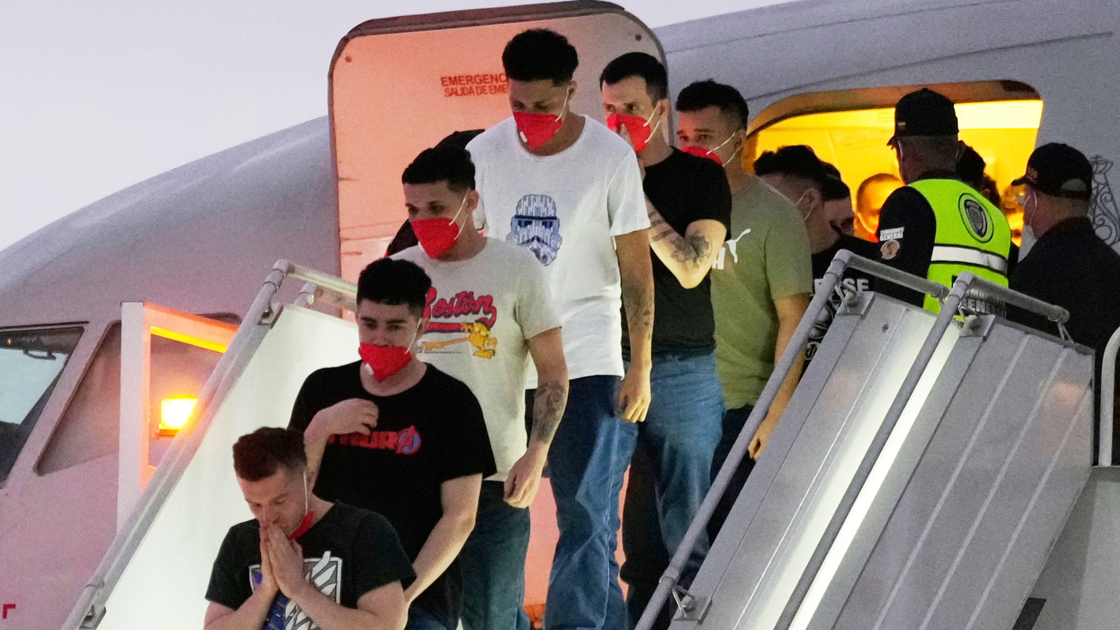 FILE - Migrants deported months before by the United States to El Salvador under the Trump administration's immigration crackdown arrive at Simon Bolívar International Airport in Maiquetia, Venezuela, July 18, 2025. (AP Photo/Ariana Cubillos, File)