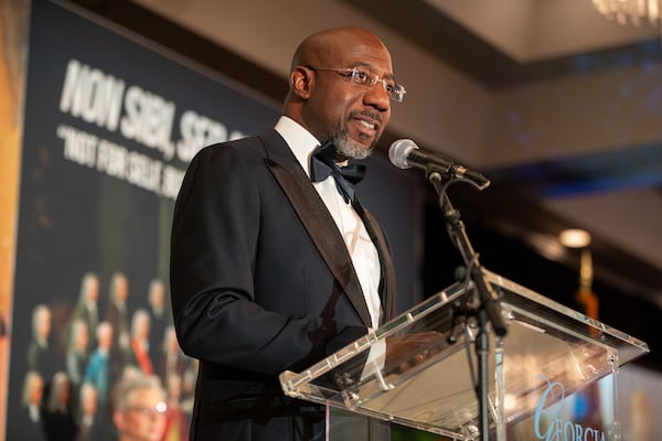 U.S. Sen. Raphael Warnock delivers the invocation at the Georgia Historical Society Trustees Gala in April in Savannah. (Courtesy)