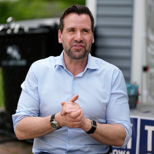 Iowa state Rep. Josh Turek, a Democratic candidate for U.S. Senate, speaks to supporters before a canvassing event, Sunday, May 31, 2026, in Waukee, Iowa. (AP Photo/Charlie Neibergall)