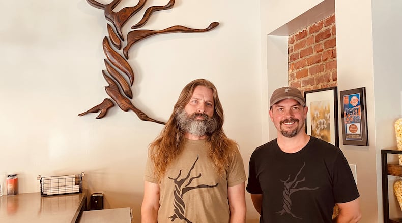Mark Henson (left) and Doug Farrell opened Skint Chestnut Brewing on Broad Street in Powder Springs last July. (Bob Townsend for The Atlanta Journal-Constitution)