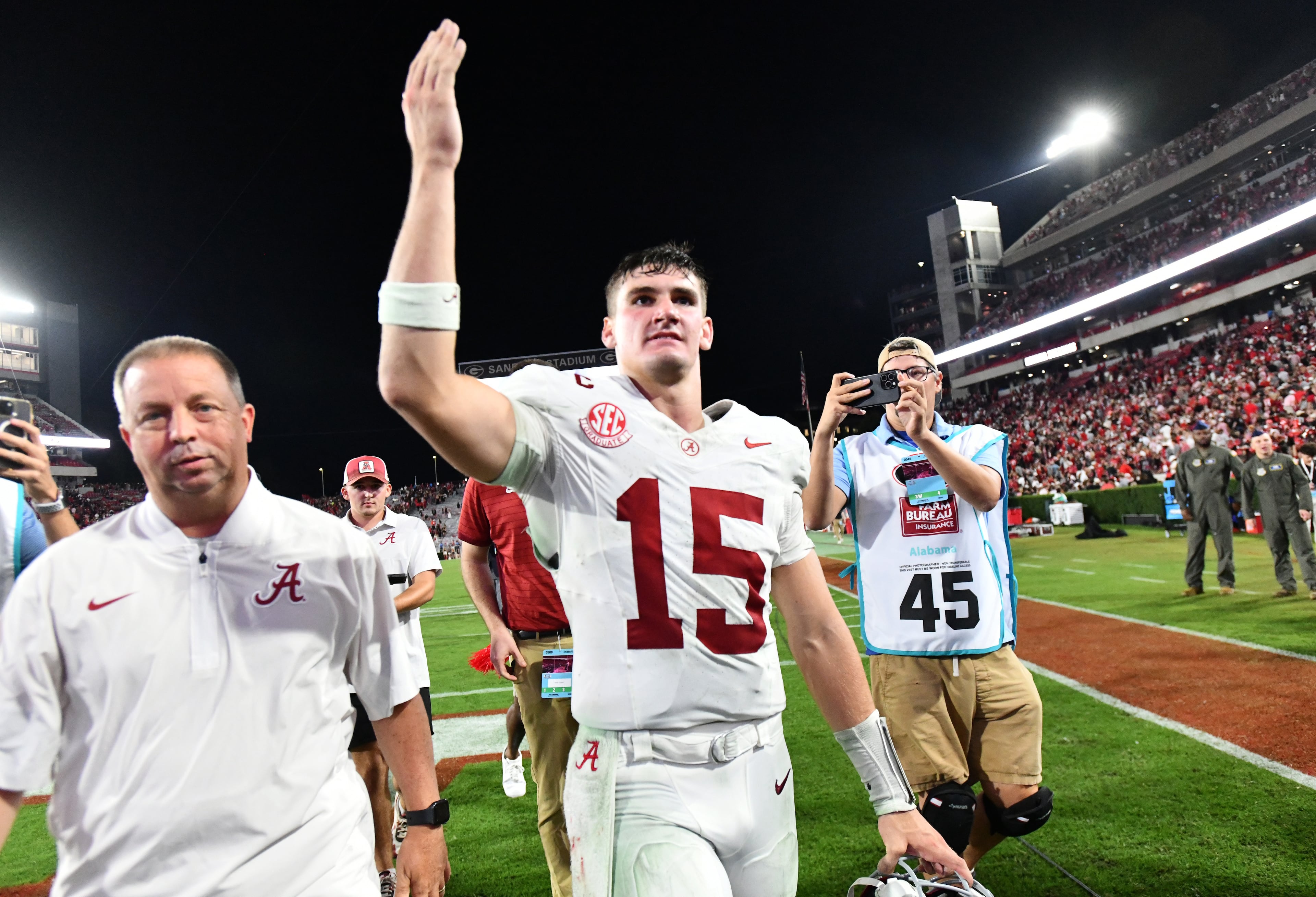 Alabama quarterback Ty Simpson (15) waves as he leaves after Alabama beat Georgia in an NCAA football game at Sanford Stadium, Saturday, September 27, 2025, in Athens. Alabama won 24-21 over Georgia. (Hyosub Shin / AJC)