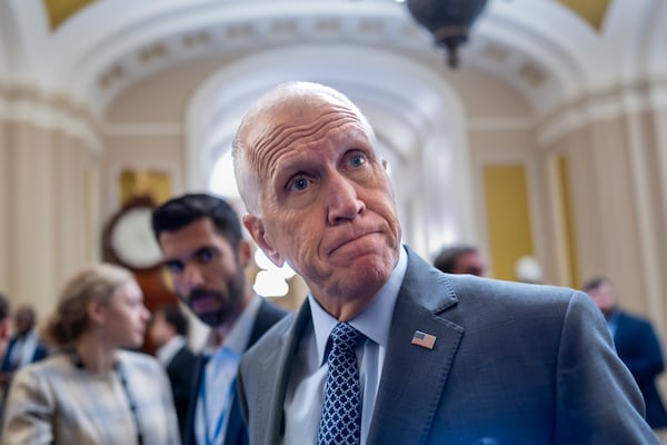 Sen. Thom Tillis, R-N.C., a member of the Senate Banking Committee, tells reporters that it would be a mistake for President Donald Trump to fire Federal Reserve Chair Jerome Powell, during a vote in the Senate, at the Capitol in Washington, Wednesday, July 16, 2025. (AP Photo/J. Scott Applewhite)
