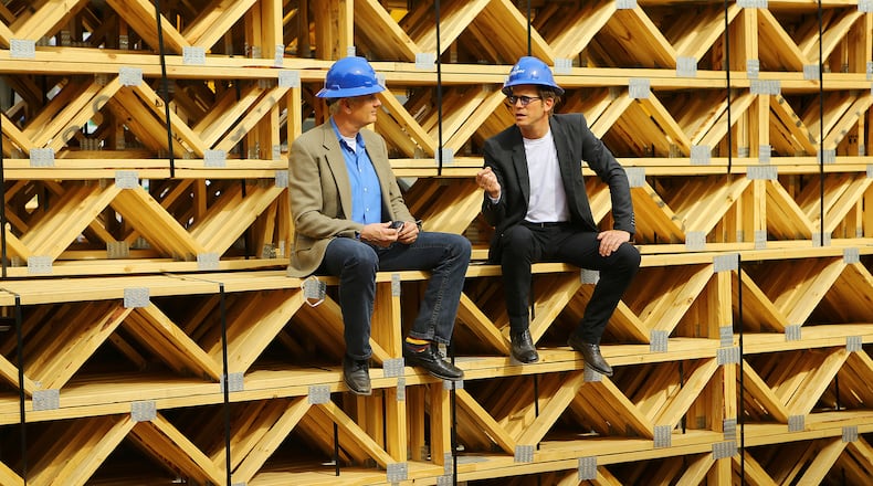 Jarel Portman (right) with partner Bruce Fernald, is shaping Inman Park with the massive mixed-use project Inman Quarters on Wednesday, April 2, 2014, in Atlanta. His father is Atlanta architect John Portman, who shaped much of downtown Atlanta. CURTIS COMPTON / CCOMPTON@AJC.COM
