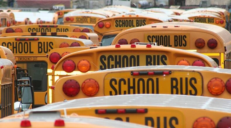School buses. File photo. (Photo: AtelierKS/Pixabay/Creative Commons: https://pixabay.com/en/service/terms/#usage)