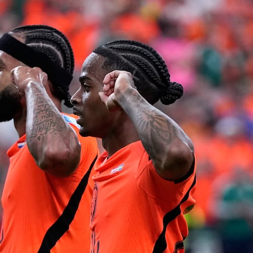 Netherlands' Crysencio Summerville celebrates with Memphis Depay, left, after scoring his side's fifth goal during the World Cup Group F soccer match between the Netherlands and Sweden in Houston, Saturday, June 20, 2026. (AP Photo/Ashley Landis)