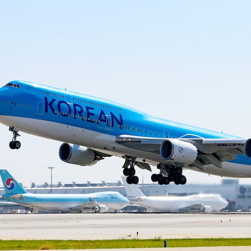 A Korean Air plane takes off from Incheon International Airport in South Korea on Wednesday, Sept. 10, 2025. The plane is chartered to bring back Korean workers detained in an immigration raid in Georgia. (Yonhap via AP)