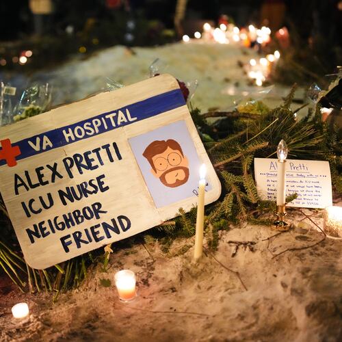 A sign for 37-year-old Alex Pretti, who was fatally shot by a U.S. Border Patrol officer Saturday, Jan. 24, 2026, is displayed during a vigil Saturday night in Minneapolis. (Adam Gray/AP)