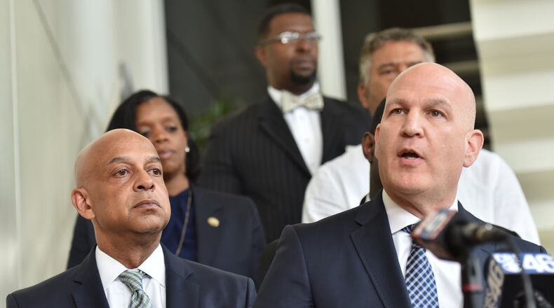 May 12, 2017 Decatur - DeKalb County Sheriff Jeffrey Mann (left) stands next to his attorney Noah Pines as he speaks for Sheriff Jeffrey Mann during a press conference at DeKalb County Sheriff Office on Friday, May 12, 2017. DeKalb County Sheriff Jeffrey Mann, speaking through his lawyer, apologized to his constituents on Friday and said he plans to continue serve in his job. HYOSUB SHIN / HSHIN@AJC.COM