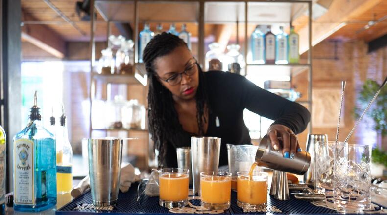 Atlanta bartender Keyatta Mincey-Parker goes from mixing drinks to planting gardens. (Courtesy of Bombay Sapphire)