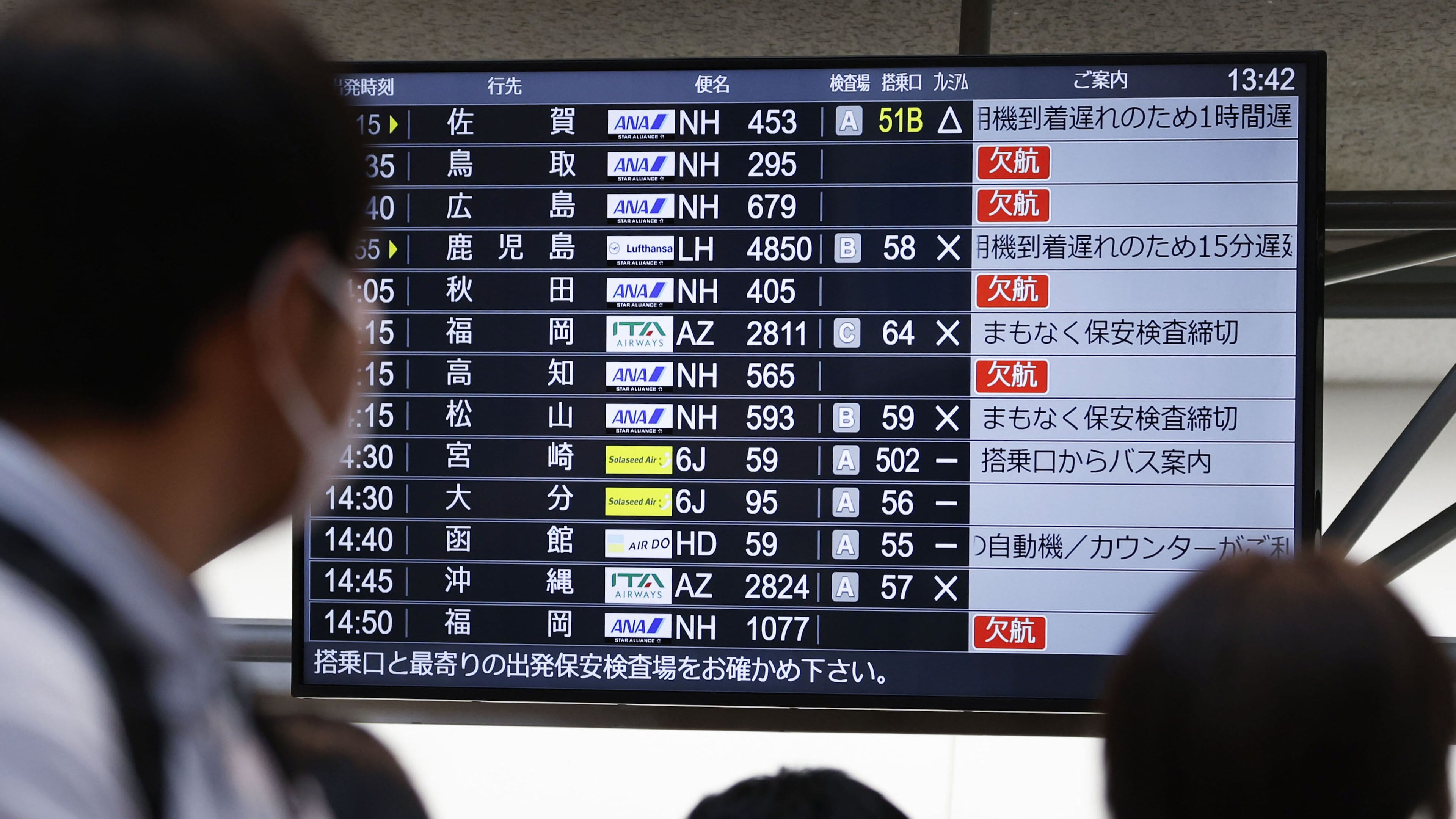The departures display board shows All Nippon Airways' multipule flights cancellation at Haneda airport in Tokyo Saturday, Nov. 29, 2025. (Takahiko Kanbara/Kyodo News via AP)