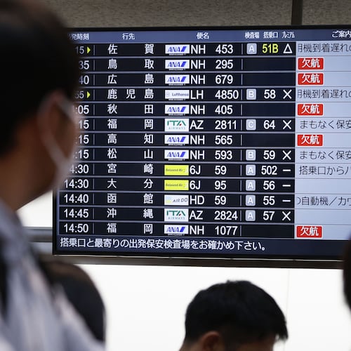 The departures display board shows All Nippon Airways' multipule flights cancellation at Haneda airport in Tokyo Saturday, Nov. 29, 2025. (Takahiko Kanbara/Kyodo News via AP)