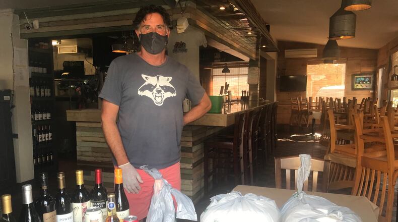 Pea Ridge owner John Peter “JP” Casey relishes personal interaction with his guests. Since reopening the restaurant, he s been a fixture on the premises. “I like to be around to greet people,” he said. LIGAYA FIGUERAS / LIGAYA.FIGUERAS@AJC.COM