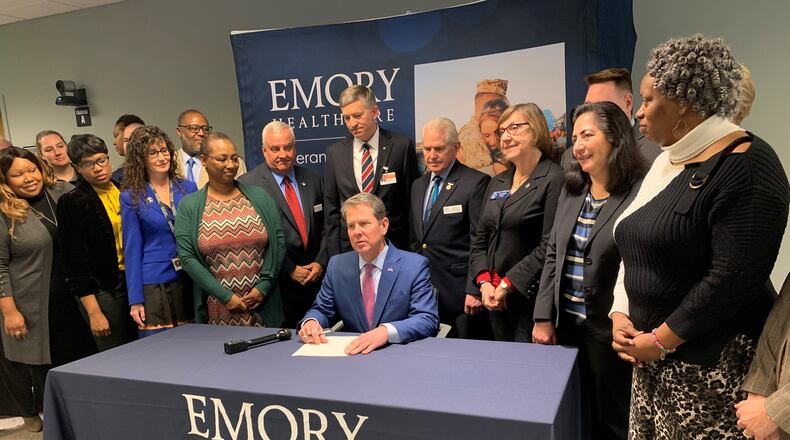 Gov. Brian Kemp on Thursday signed a letter to join a federal initiative for preventing suicides among U.S. service members, veterans and their families. JEREMY REDMON/jredmon@ajc.com