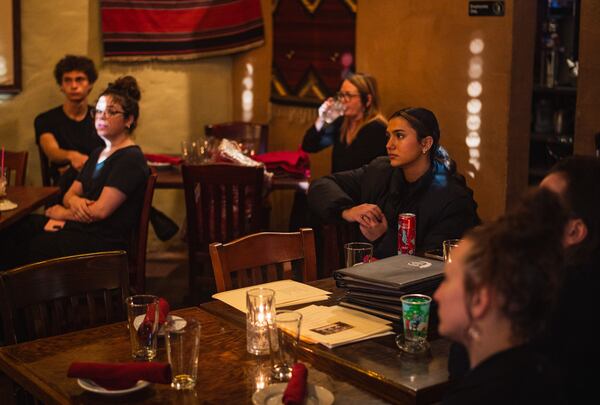 Agave employees intently listen to chef and owner Jack Sobel before service on Thursday, Jan. 15, 2026. In October, the restaurant announced that it would close Jan. 31. (Henri Hollis/AJC)