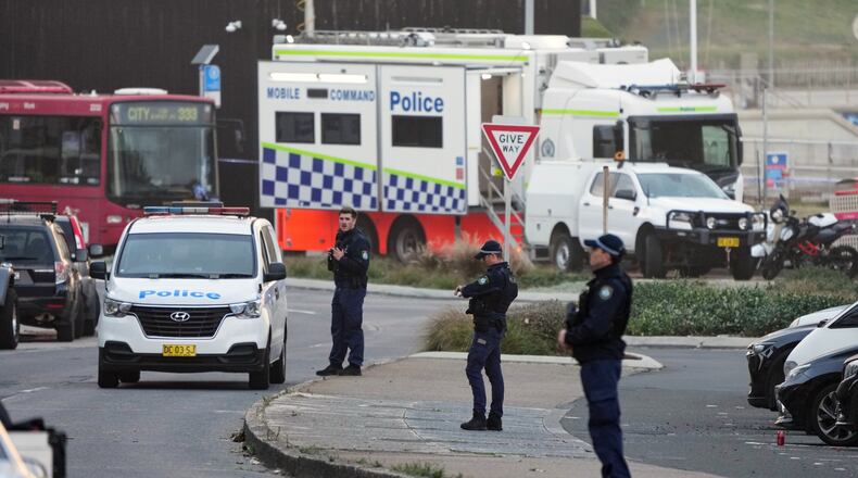 FILE - Police patrol in the early morning at Sydney's Bondi Beach, Dec. 15, 2025, following the previous day's shooting. (AP Photo/Mark Baker, File)