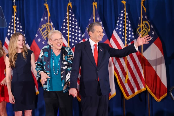 GOP nominee for governor Rick Jackson, with his wife Melody, greets supporters at his election night party at the Westin Atlanta Perimeter North. (Jason Getz/AJC)