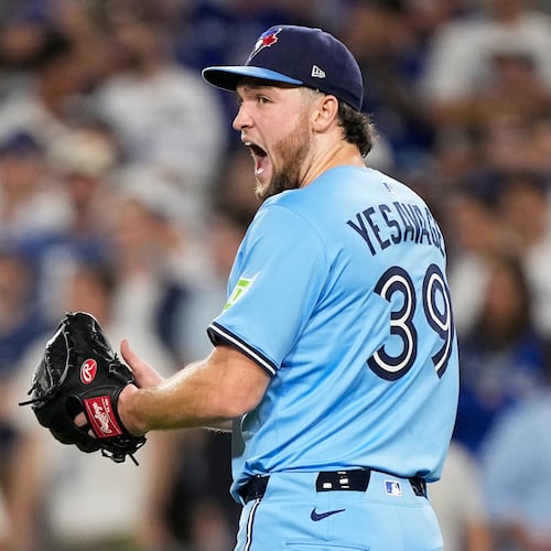 Toronto Blue Jays pitcher Trey Yesavage celebrates the end on the seventh inning in Game 5 of baseball's World Series against the Los Angeles Dodgers, Wednesday, Oct. 29, 2025, in Los Angeles. (AP Photo/Brynn Anderson)
