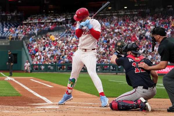 Philadelphia Phillies' Bryce Harper is hit by a pitch from Atlanta Braves' Spencer Strider during the first inning of a baseball game Tuesday, May 27, 2025, in Philadelphia. (AP Photo/Matt Slocum)
