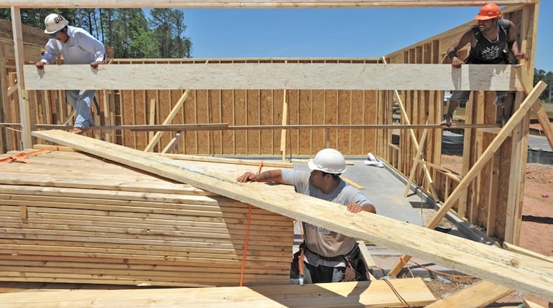 Milton has clarified its development ordinances to ensure future housing subdivisions with minimum 3-acre lot sizes if they front gravel roads. HYOSUB SHIN / HSHIN@AJC.COM