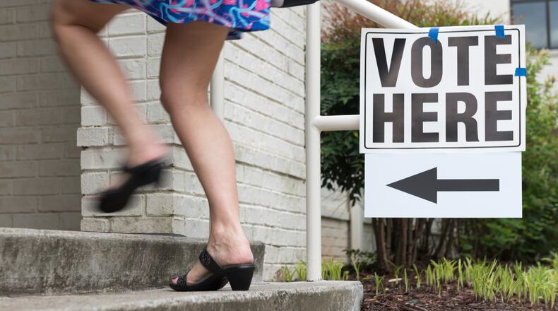 A voter walks into Mt. Zion United Methodist Church in Marietta, Georgia on election day. (FILE PHOTO: DAVID BARNES / DAVID.BARNES@AJC.COM)