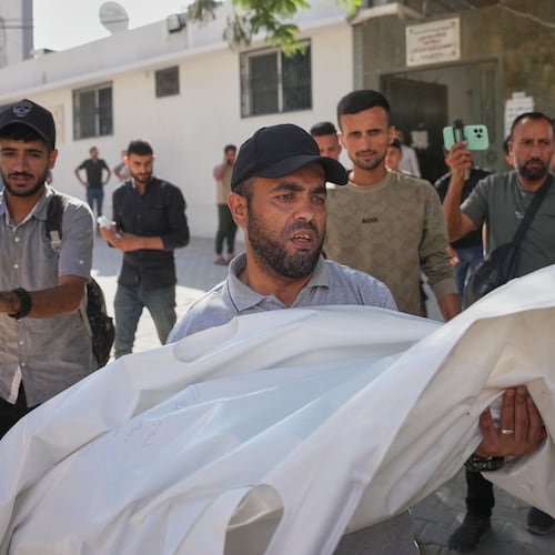 Mourners carry the bodies of two Palestinian girls Zeina Safadi, and her sister Lana, who were killed during an overnight Israeli airstrike that damaged their home, during their funeral in Gaza city, Saturday, June 20, 2026. (AP Photo/Abdel Kareem Hana)