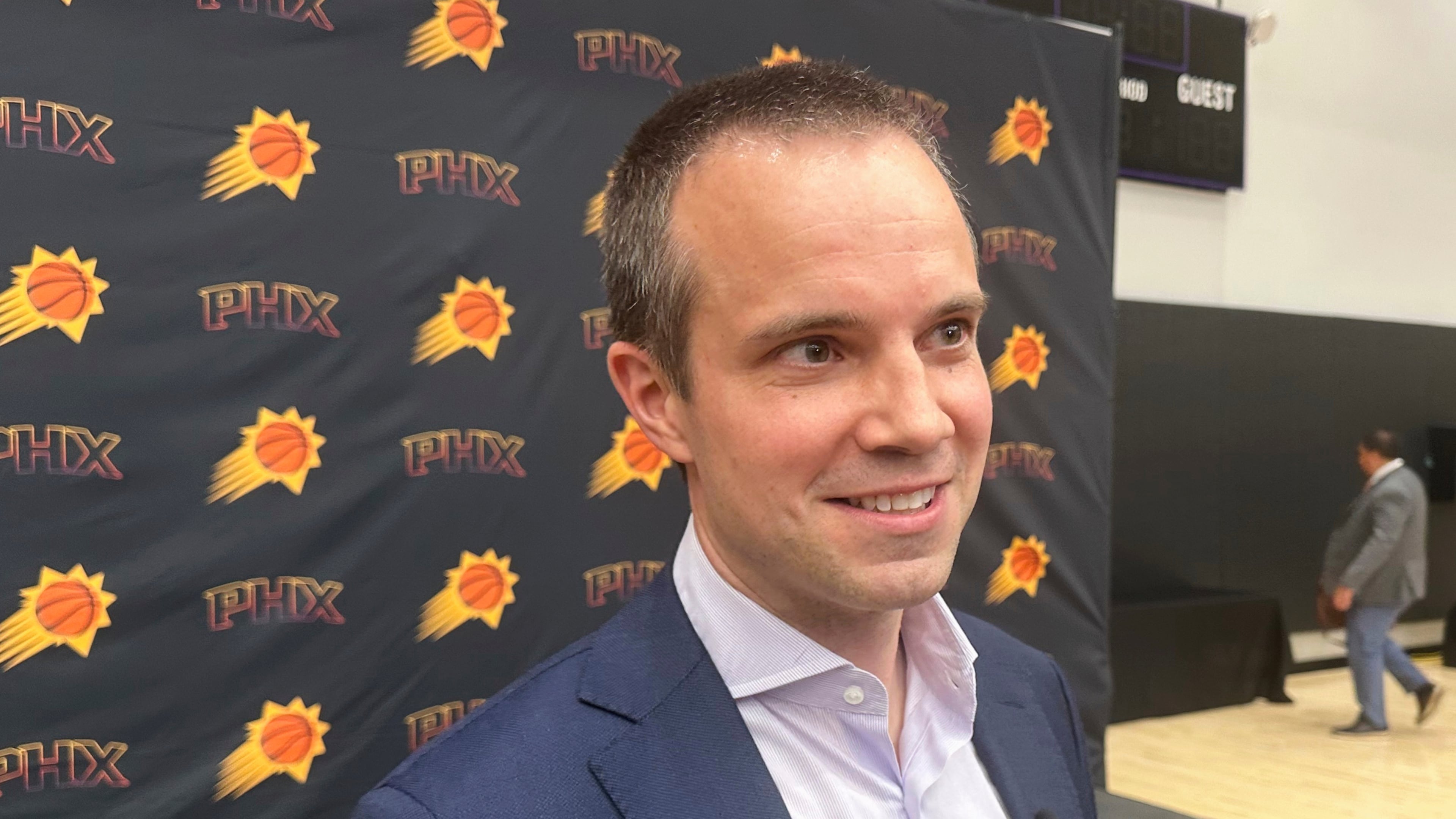 FILE - New Phoenix Suns head coach Jordan Ott talks with reporters during his introductory news conference June 10, 2025, at the team's practice facility in Phoenix. (AP Photo/David Brandt, File)