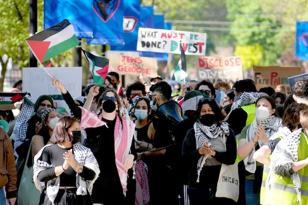 FILE- Pro-Palestinian protesters demonstrate on the campus of DePaul University, April 30, 2024, in Chicago. (AP Photo/Charles Rex Arbogast, file)