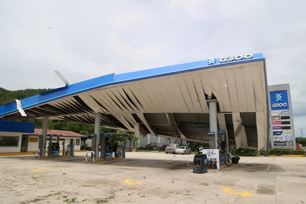A gas station is damaged after Hurricane Erick hit near San Jose del Progreso, Oaxaca state, Mexico, Thursday, June 19, 2025. (AP Photo/Luis Alberto Cruz)
