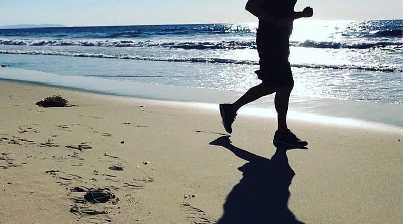 KP Kelly ran on the beach in Santa Monica, California during eight days of his #100Run challenge. He is running 100 marathons in 100 days for charities across the country, and just completed a marathon in Atlanta. (Courtesy KP Kelly)